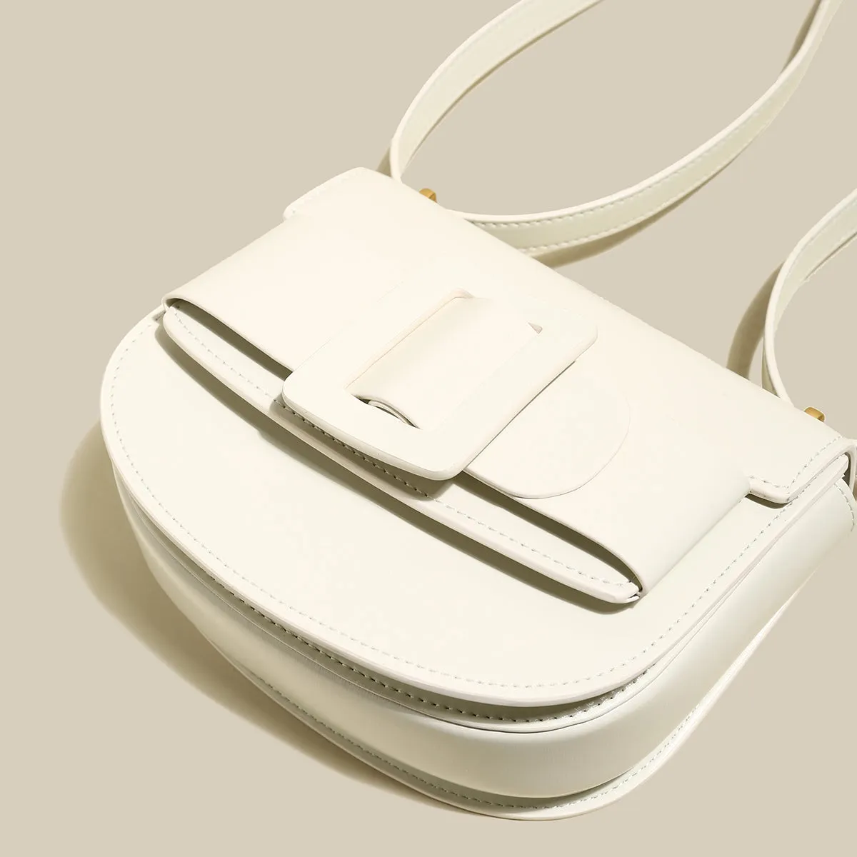 Ivory White Buckle Saddle Bag