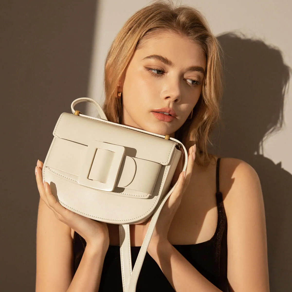 Ivory White Buckle Saddle Bag