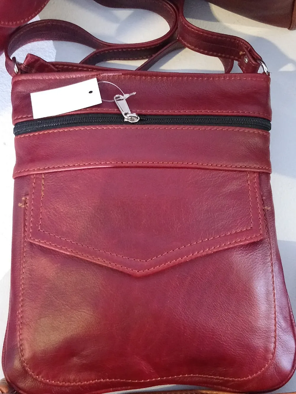 Leony Sling leather Bags