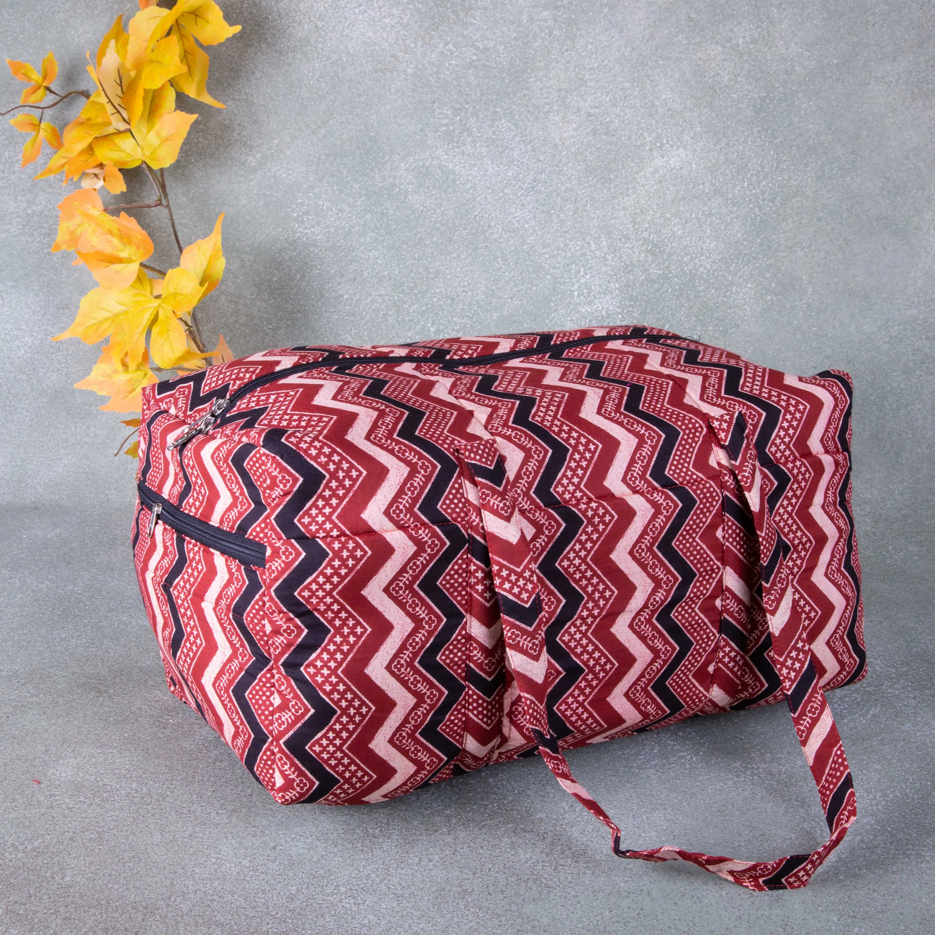 Rectangle Travel Bag Maroon Color with Black Color Zig Zag Design.